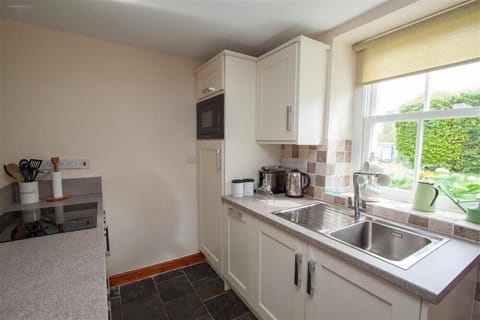 Fridge, dishwasher, cookware/dishes/utensils