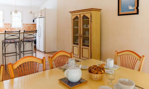 Reconnect with loved ones over a meal at the dining table.