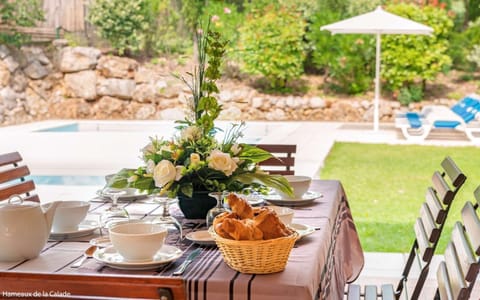 Relax and unwind on the outdoor terrace next to your private pool.