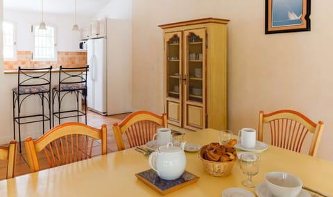 Reconnect with loved ones over a meal at the dining table.