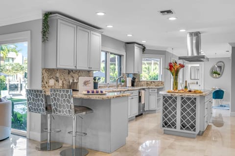 The kitchen holds all your finest amenities with high end appliances, a nice center island and comfortable bar top.