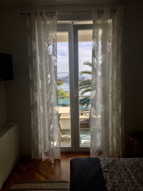 Comfort Room, 1 Queen Bed, Balcony, Sea View | Iron/ironing board, free WiFi, bed sheets