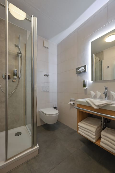 Family Triple Room | Bathroom | Combined shower/tub, free toiletries, hair dryer, towels