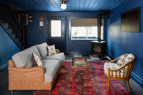 Joseph's Hut | Living area | TV, fireplace