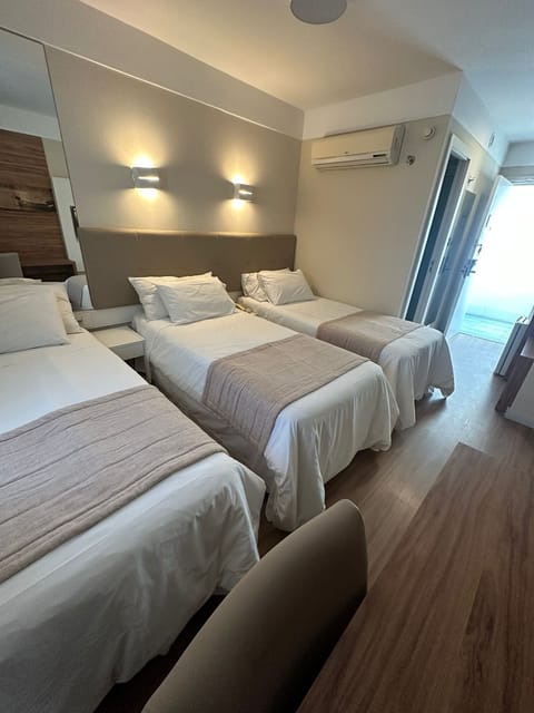 Deluxe Triple Room, 3 Twin Beds | Free WiFi, bed sheets