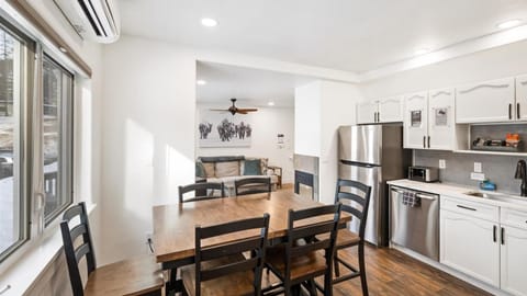Open concept kitchen and dining area with seating for 6.
