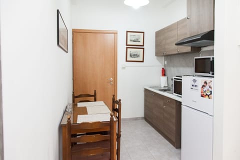 Apartment | Private kitchen | Full-size fridge, microwave, oven, stovetop