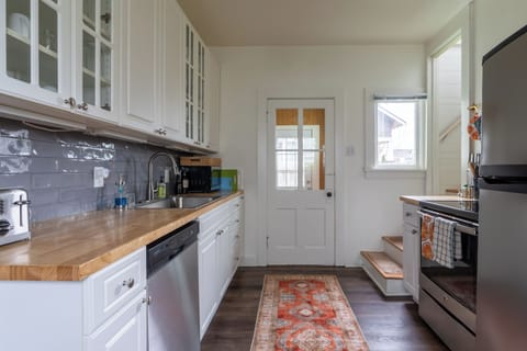 Large kitchen for preparing a snack or cooking a full meal.