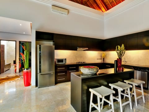 Villa Amala | Private kitchen | Full-size fridge, microwave, oven, stovetop