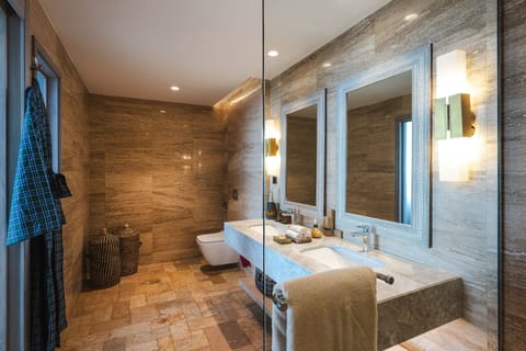 Family Room | Bathroom | Designer toiletries, hair dryer, bathrobes, slippers
