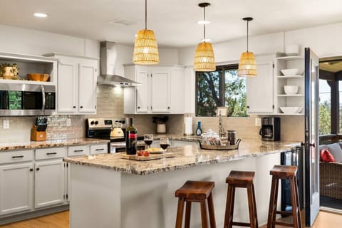 The kitchen is fully equipped with all the appliances and kitchenware to prepare delicious meals