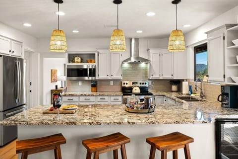 The kitchen is fully equipped with all the appliances and kitchenware to prepare delicious meals