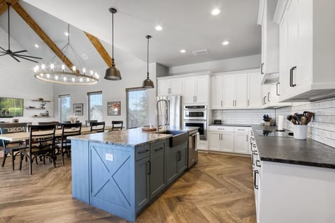 Entering the home walking into the kitchen on the right.