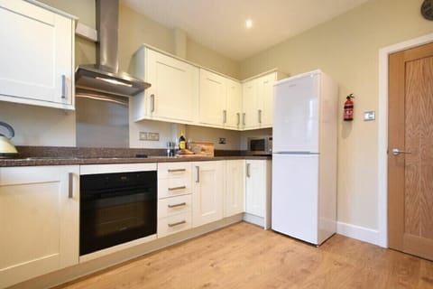 Fridge, dishwasher, cookware/dishes/utensils