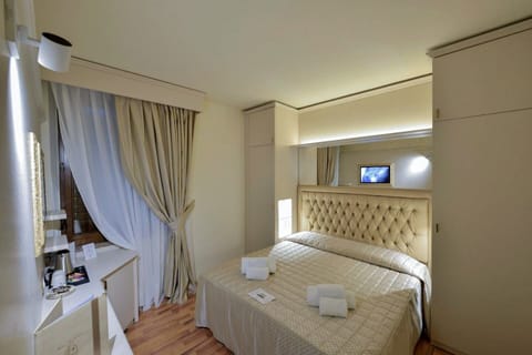 Superior Double or Twin Room | Minibar, desk, laptop workspace, soundproofing