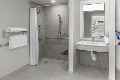 Room, 2 Queen Beds | Bathroom | Combined shower/tub, free toiletries, hair dryer, towels