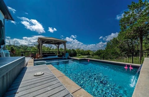Gorgeous pool with waterfall and shelf to enjoy, relaxing and getting some sun1