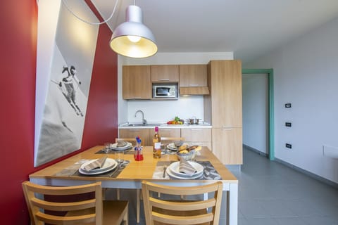 view on dining table and kitchen