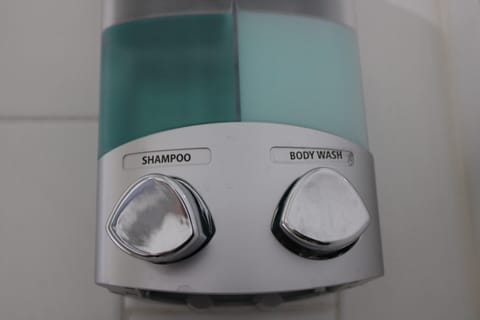 Body Wash/Shampoo Dispenser Stocked in Shower