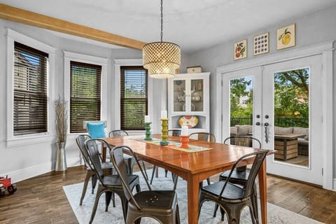 This dining area looks walks directly out to the rear deck where there is a large sectional, offering great flow between the two spaces
