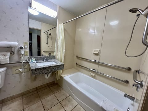 Suite, 1 Queen Bed with Sofa bed, Accessible, Non Smoking (Promotional) | Bathroom | Combined shower/tub, hair dryer, towels