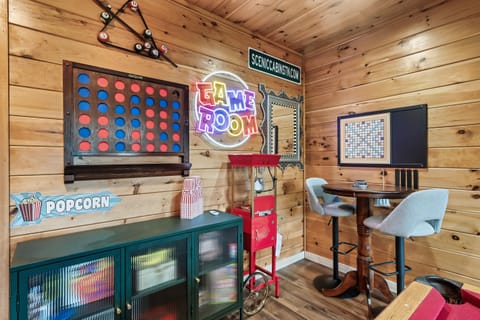 Something for everyone in our game room, complete with a popcorn machine for the perfect snack!