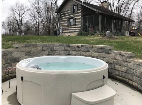 Hot tub located near the cabin.