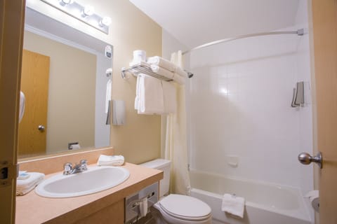 Standard Room, 2 Queen Beds | Bathroom | Combined shower/tub, free toiletries, hair dryer, towels