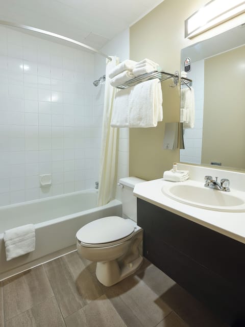 Standard Room, 2 Queen Beds | Bathroom | Combined shower/tub, free toiletries, hair dryer, towels