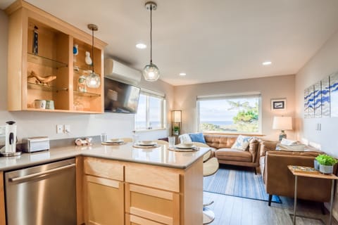 Kitchen with Dishwasher and View of Living