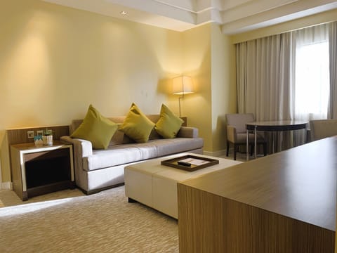 One-Bedroom Suite | Living area | 40-inch flat-screen TV with satellite channels, TV, iPod dock