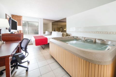 Suite, 1 King Bed, Non Smoking, Hot Tub | Desk, blackout drapes, iron/ironing board, free cribs/infant beds