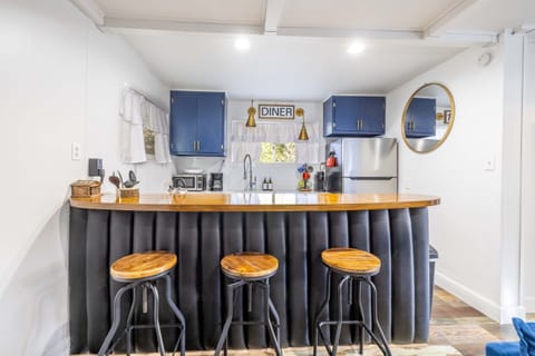 With comfortable barstools and a spacious counter, you can chat with your party while whipping up a delicious meal. Enjoy the convenience and camaraderie of our inviting space during your stay.