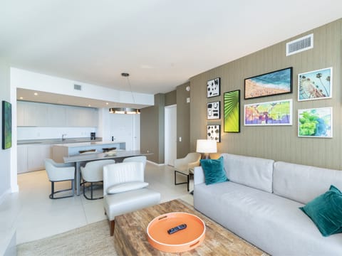 Exclusive Condo | Living area | 34-inch LED TV with cable channels, TV