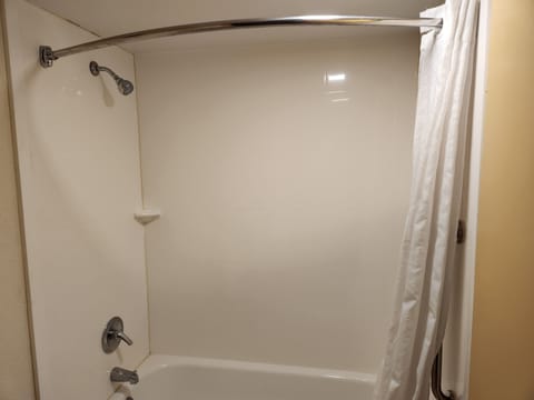 Standard Room, 1 King Bed, Smoking | Bathroom | Combined shower/tub, eco-friendly toiletries, hair dryer, towels