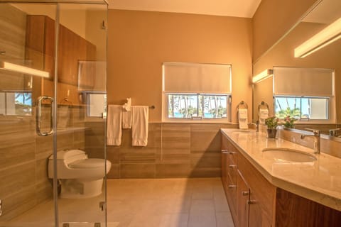 Deluxe Suite, 2 Bedrooms, Ocean View | Bathroom | Hair dryer, towels, soap, shampoo