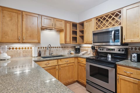 Standard Condo, 2 Bedrooms | Private kitchen | Fridge, microwave, stovetop, coffee/tea maker