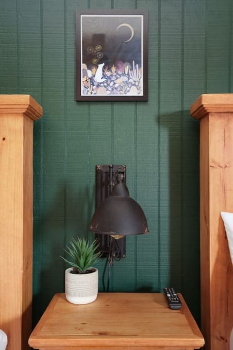 Experience the perfect blend of comfort and style in our Southwest-inspired bedroom. Unwind after a day on the river with our 43` LG TVs, perfect for catching up on your favorite shows or movies.