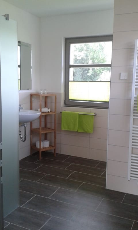 Double Room | Bathroom | Shower, hair dryer, heated floors, towels