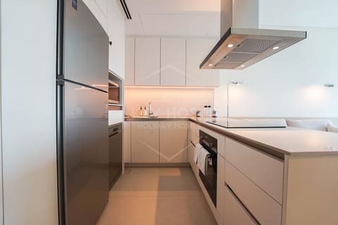 Deluxe Apartment, 2 Bedrooms | Private kitchen | Full-size fridge, dishwasher, cookware/dishes/utensils