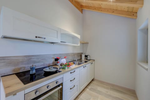 Family Apartment, 1 Bedroom (Ricomilla-Finestra Sul Verde- priv) | Private kitchen | Fridge, oven, stovetop, dishwasher