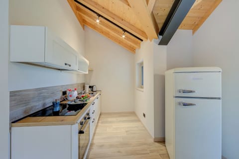 Family Apartment, 1 Bedroom (Ricomilla-Finestra Sul Verde- priv) | Private kitchen | Fridge, oven, stovetop, dishwasher