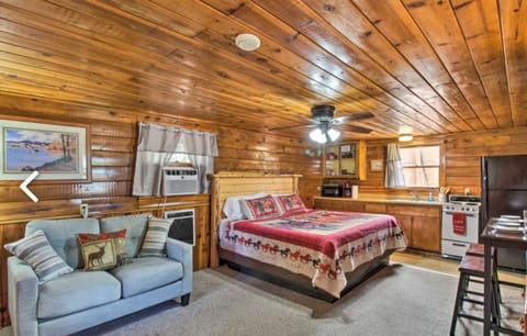 Deluxe Cabin | Living area | 32-inch Smart TV with satellite channels, DVD player, streaming services