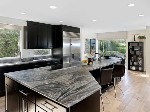 Fully stocked expansive modern kitchen