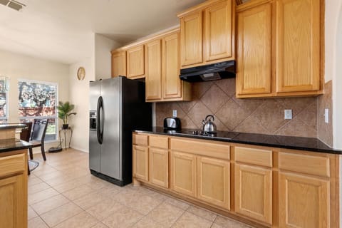 the large windows provide ample natural light and stunning views of the surrounding area.