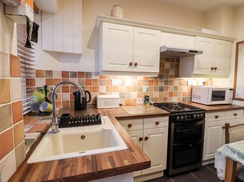 Fridge, electric kettle, toaster, cookware/dishes/utensils