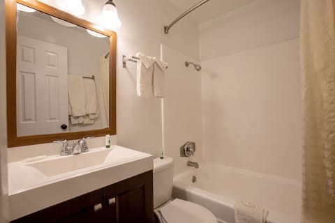 Room, 2 Queen Beds, Non Smoking, Refrigerator & Microwave | Bathroom | Shower, free toiletries, hair dryer, towels