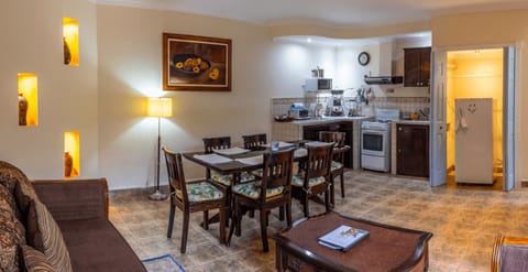 Family Villa, 2 Bedrooms | Private kitchen | Fridge, microwave, stovetop, coffee/tea maker