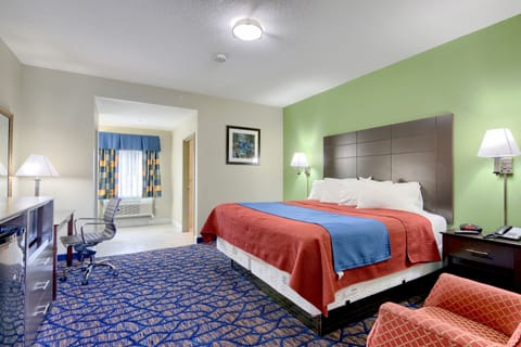 Deluxe Room, 1 King Bed, Non Smoking | In-room safe, desk, iron/ironing board, free cribs/infant beds