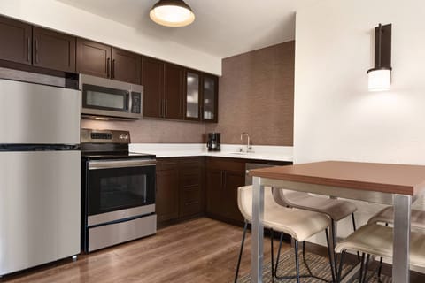 Suite, 2 Bedrooms, Fireplace | Private kitchen | Fridge, microwave, stovetop, dishwasher